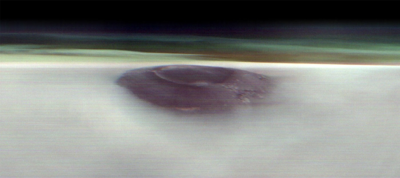 NASA опубликовало редкий снимок марсианского вулкана, возвышающегося над облаками