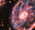 Телескоп Уэбба снял галактику Колесо Телеги и самую далекую звезду во Вселенной