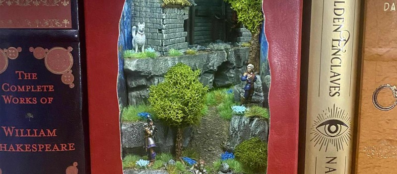 Фанат Baldur's Gate 3 сделал шикарную книжную миниатюру Всхожей дороги с Шкрябом и спрятанной Карлах
